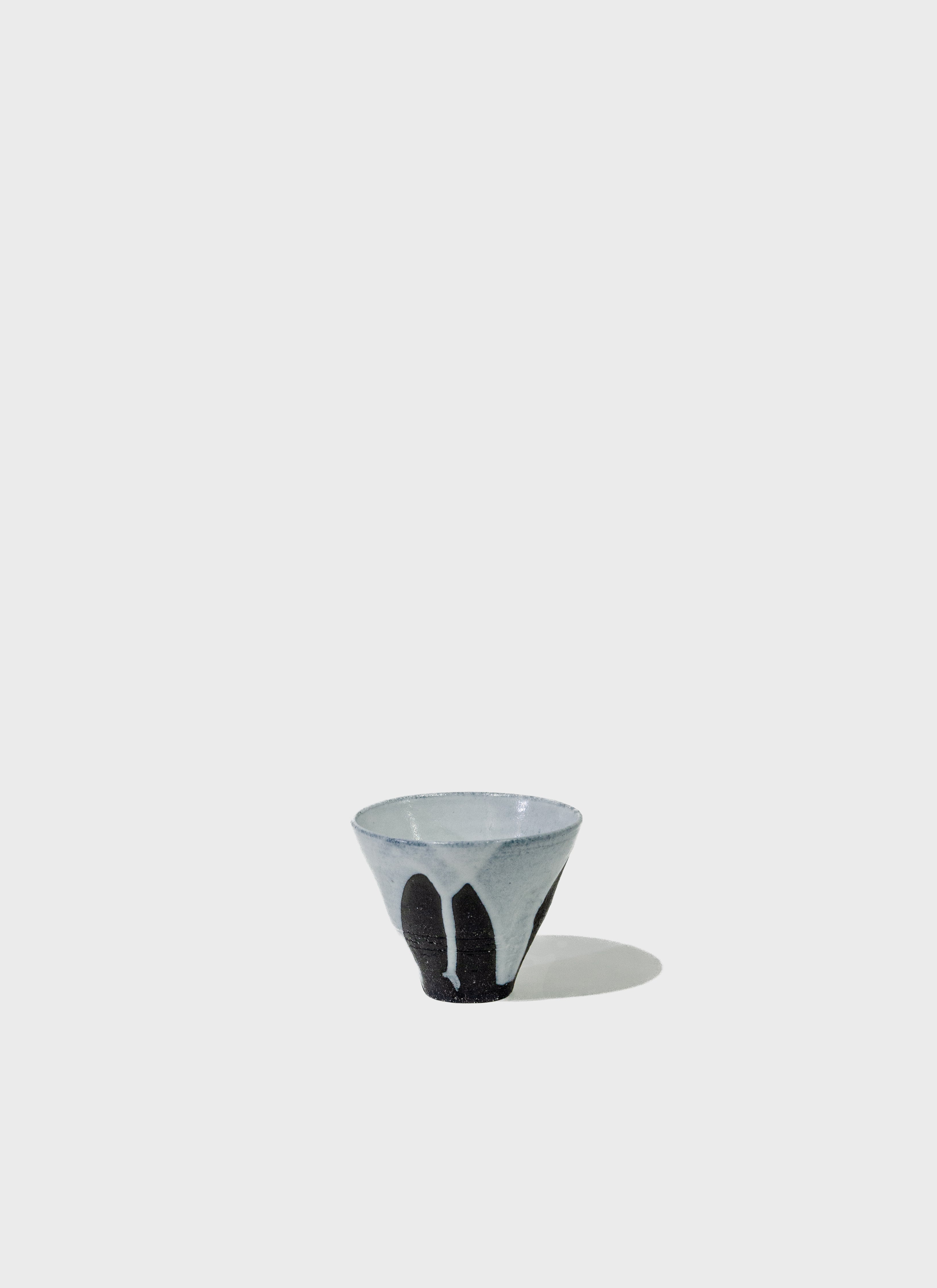 Black Ceramic Cup with Drip Glaze in White