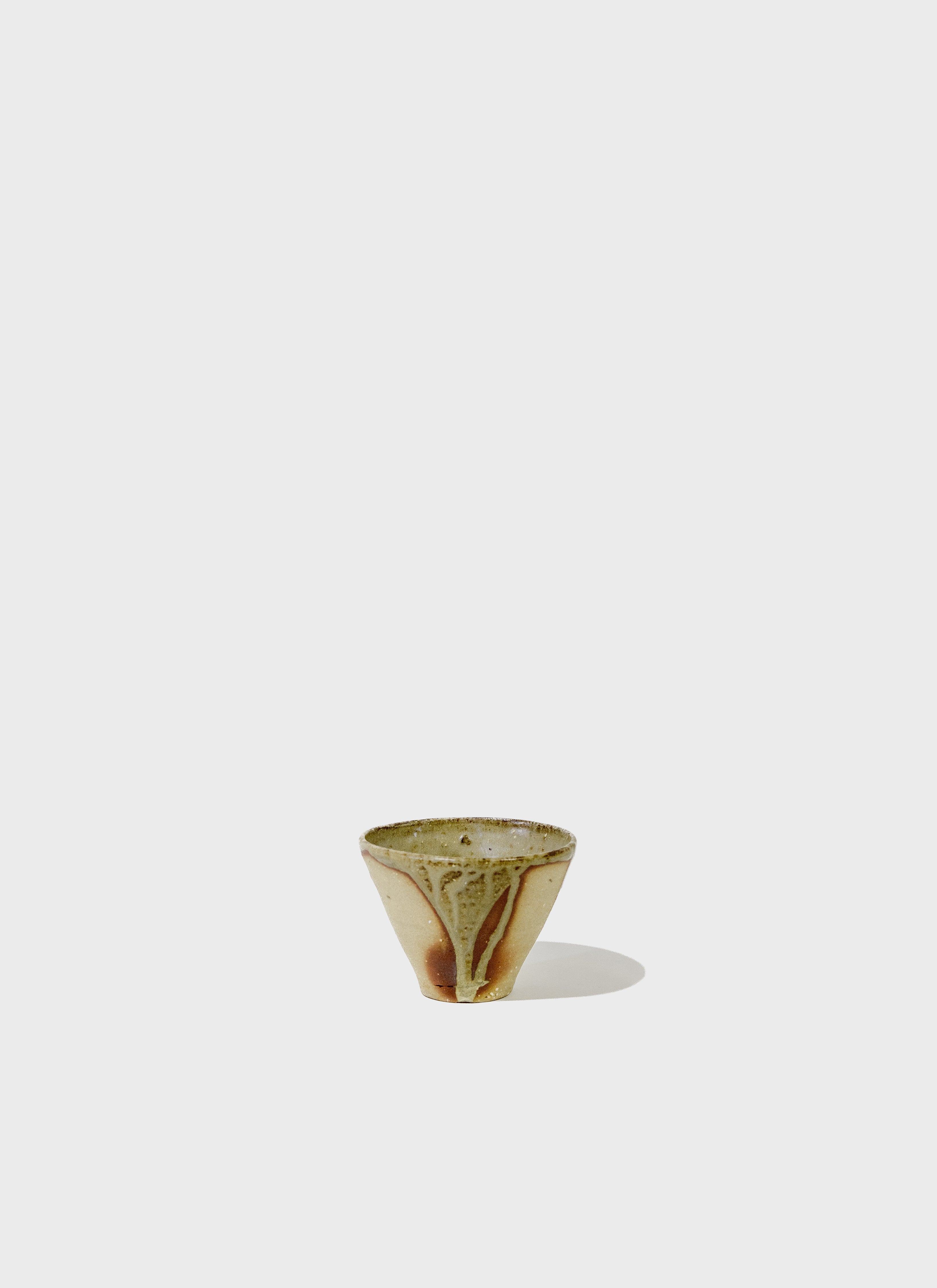 Red Ceramic Cup with Green Ash Drip Glaze